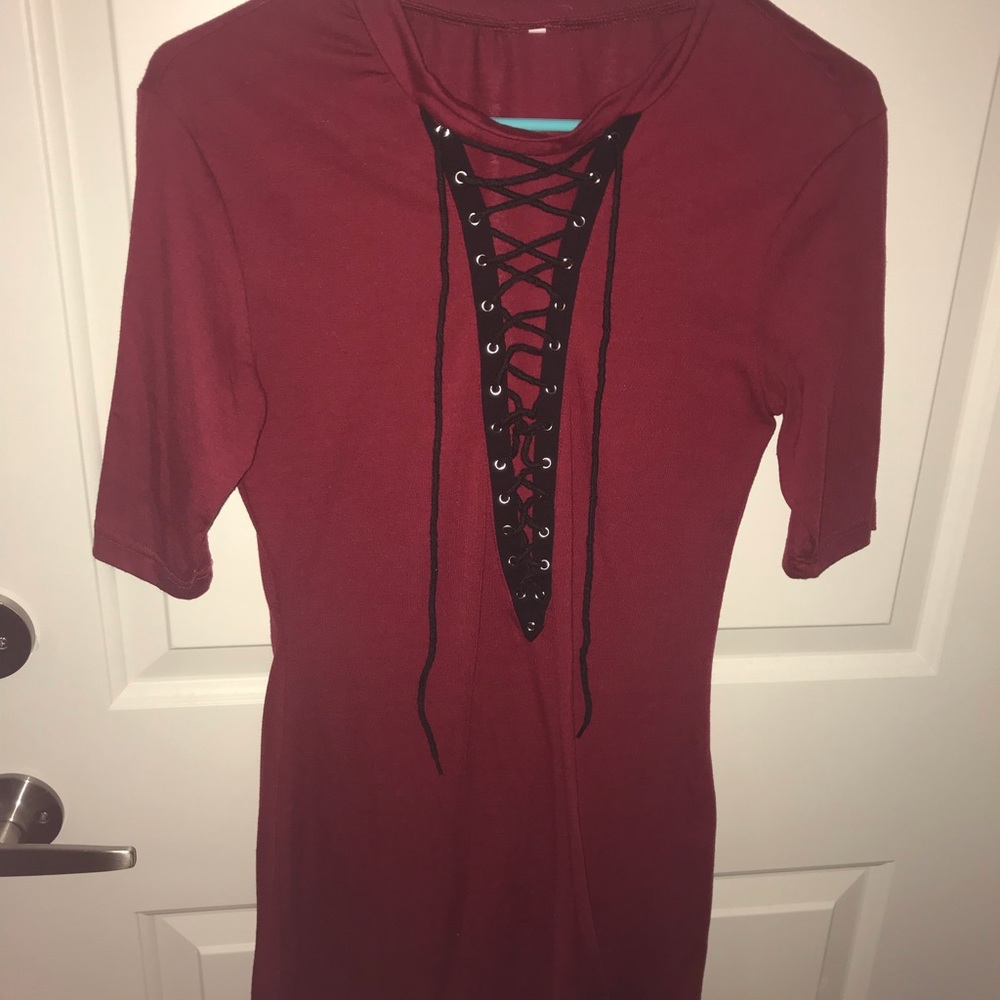 Red lace up dress.